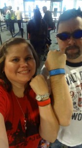 My husband and I ready to use our MagicBands for the first time to board Disney's Magical Express.