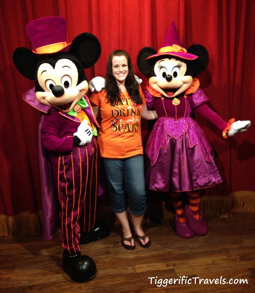 Tiggerific Travels Agent Marisha poses with Mickey and Minnie in their Halloween Costumes